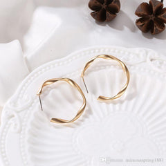 Mirage Simple twisted hoop earrings