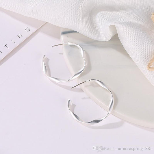 Mirage Simple twisted hoop earrings