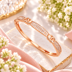 Rosé Infinity Sparkle rose-gold-tone kids bracelet with clear crystal-style stones and linked-circle accents
