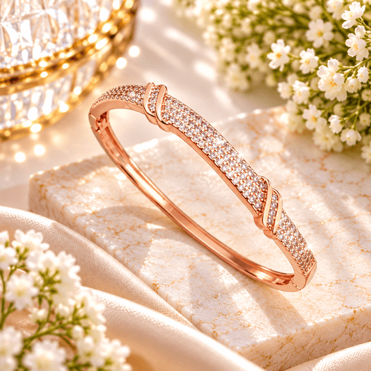Rosé Twinkle Luxe rose-gold-tone kids bracelet with sparkling crystal-style stones and curved bangle design