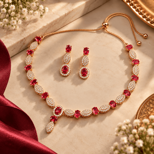 Ruby red crystal necklace and matching earrings set with gold-tone finish