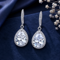 Silver teardrop drop earrings with whitecrystal stone and sparkling halo for women
